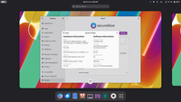 A screenshot of a close to default Gnome desktop enviroment with the Blendpills background. The settings application is open on the System page, showing the logo of Secureblue and system information.